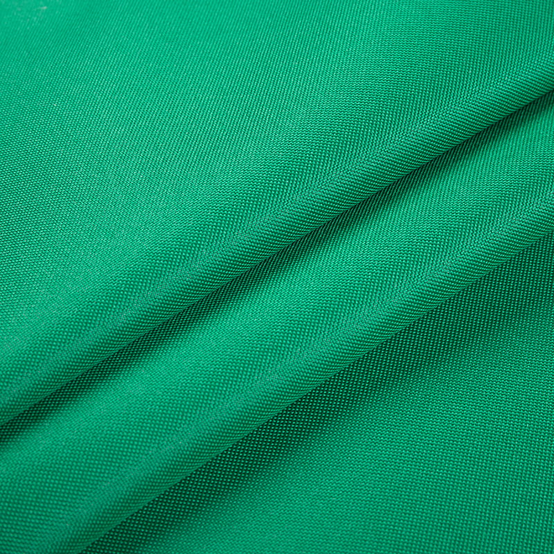 How does low-stretch silk Oxford fabric perform in different weather conditions?